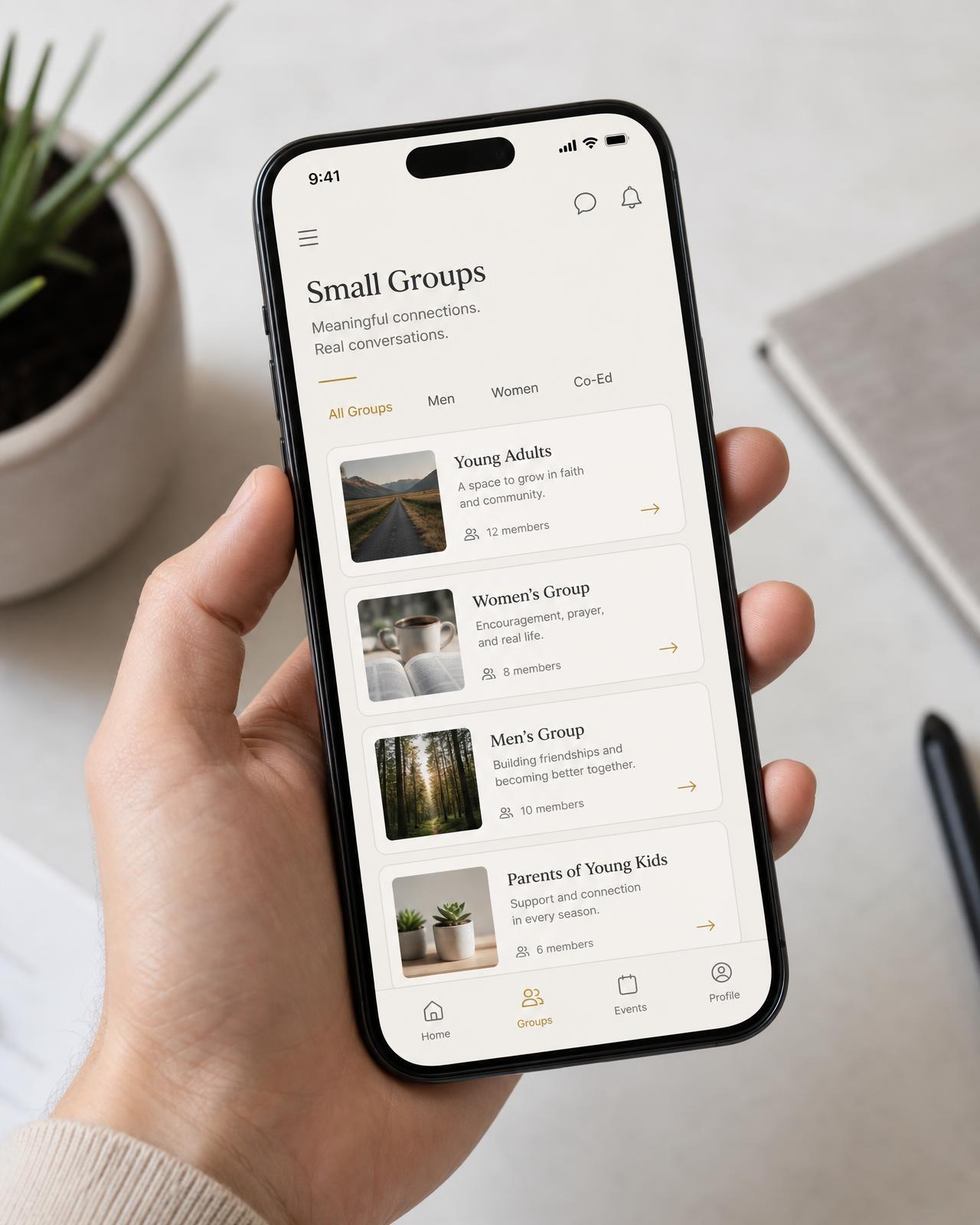 The ChristWorks app showing a list of Christian small groups on a phone